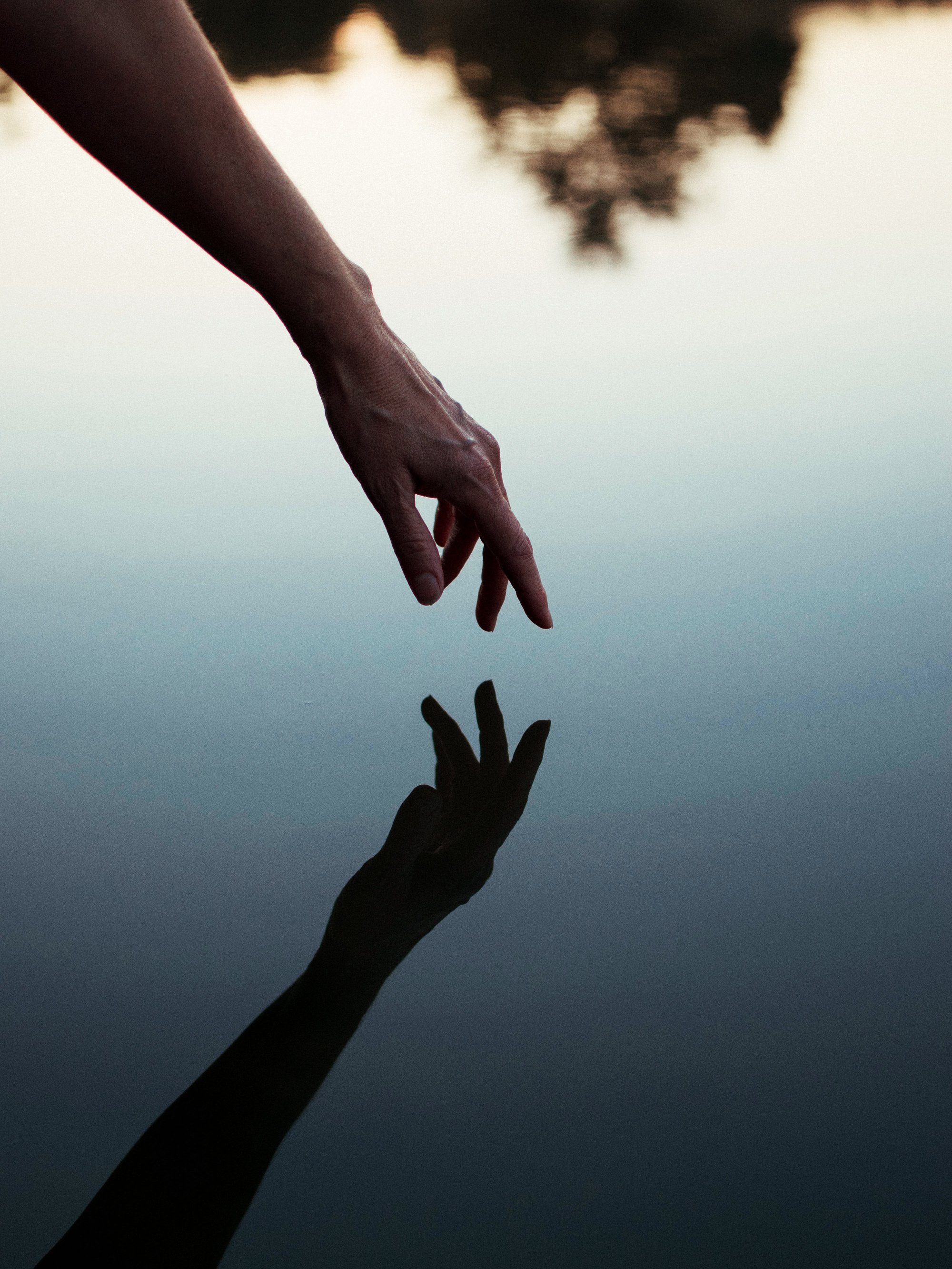 Hand Reflection on Water